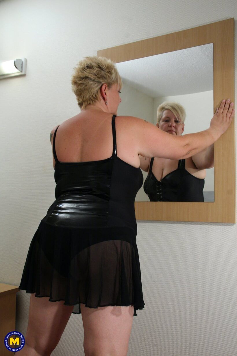 BBW pic 2 from the set «Short blonde mature BBW spreads her pussy with a finger»