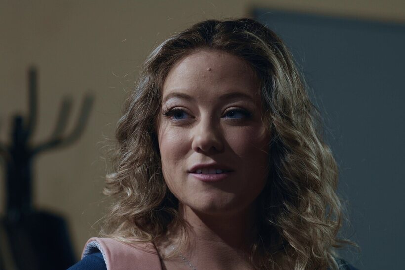 Cute River Lynn gets naked in the office with Charles Dera (shot 3)