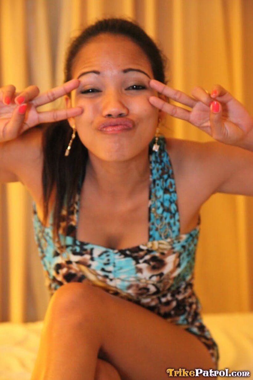 Photo 2 — Hairy Asian girl Vanessa shows her tits and pussy on bed