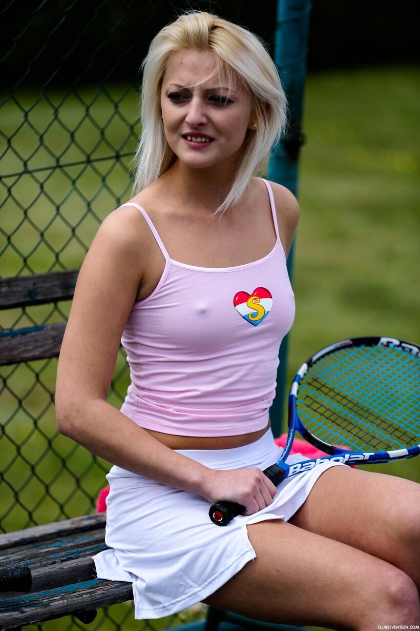Photo 9 — Katy E flashes her small tits and grinds her twat on the tennis court