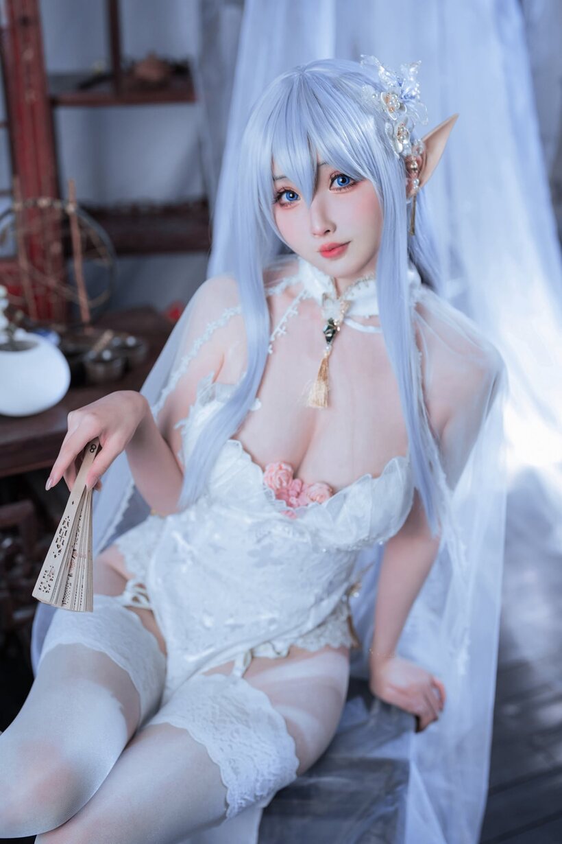 Photo 1 — Lacy garter belt solo show from a cute Asian elf babe