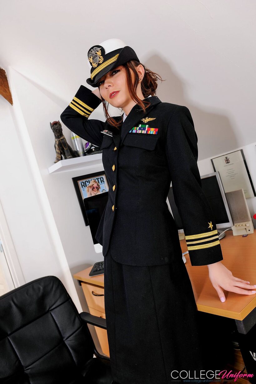 Image 1/21: Helen G strips out of her uniform and goes topless