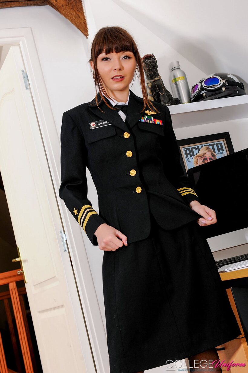 Photo 6 — Helen G strips out of her uniform and goes topless