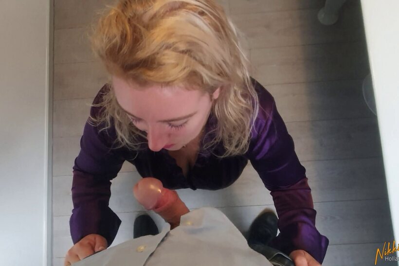 Nikki Holland drops to her knees and deepthroats a cock with cleavage out, photo 1 of 12