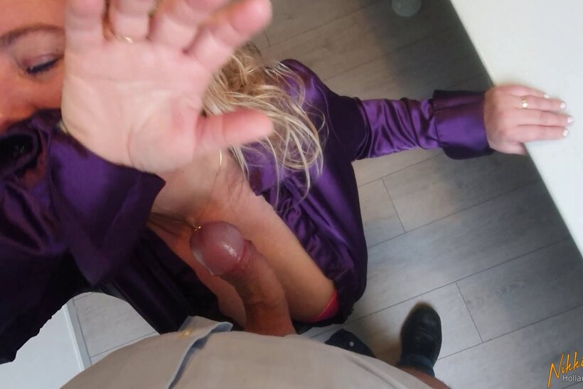 Photo 5 — Nikki Holland drops to her knees and deepthroats a cock with cleavage out