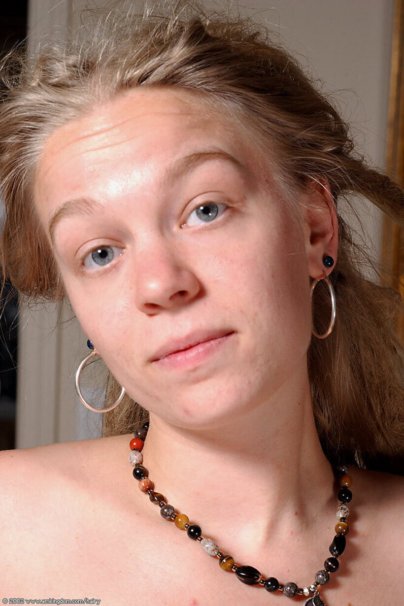 Amateur girl in a skirt shows her tiny tits and hairy pussy, photo 21 of 21