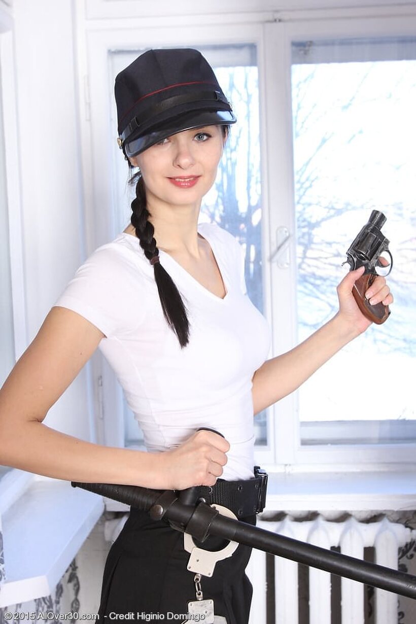 Helena Black nude photo 2 — Helena Black strips her police uniform and teases her pussy with a nightstick