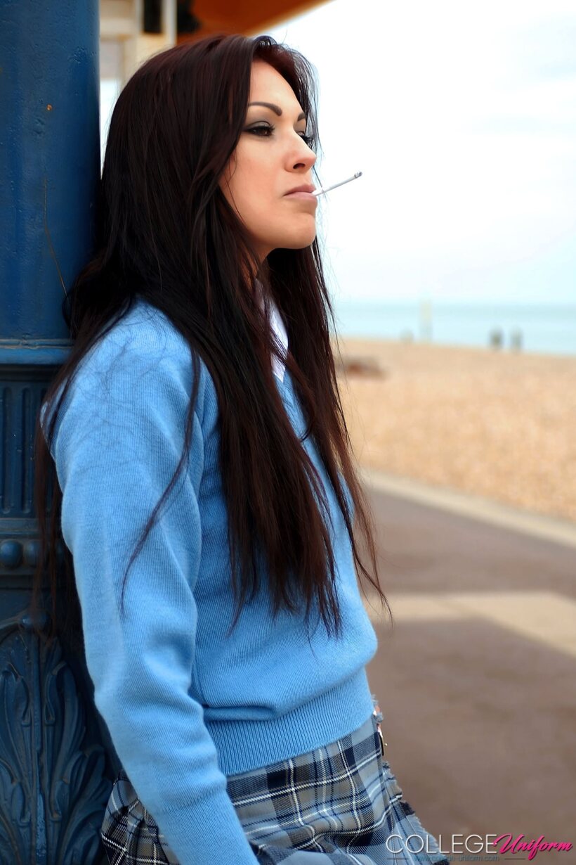 Amateur nude photo 16 — Zoey waits for the bus in a skirt, smoking a cigarette