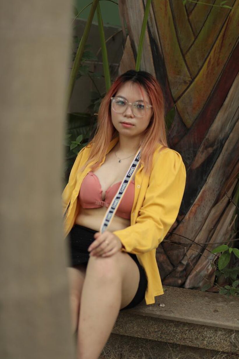 Redhead girl exposes her big tits outdoors (shot 7)