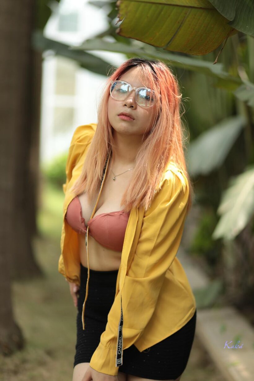 Redhead girl exposes her big tits outdoors (shot 16)