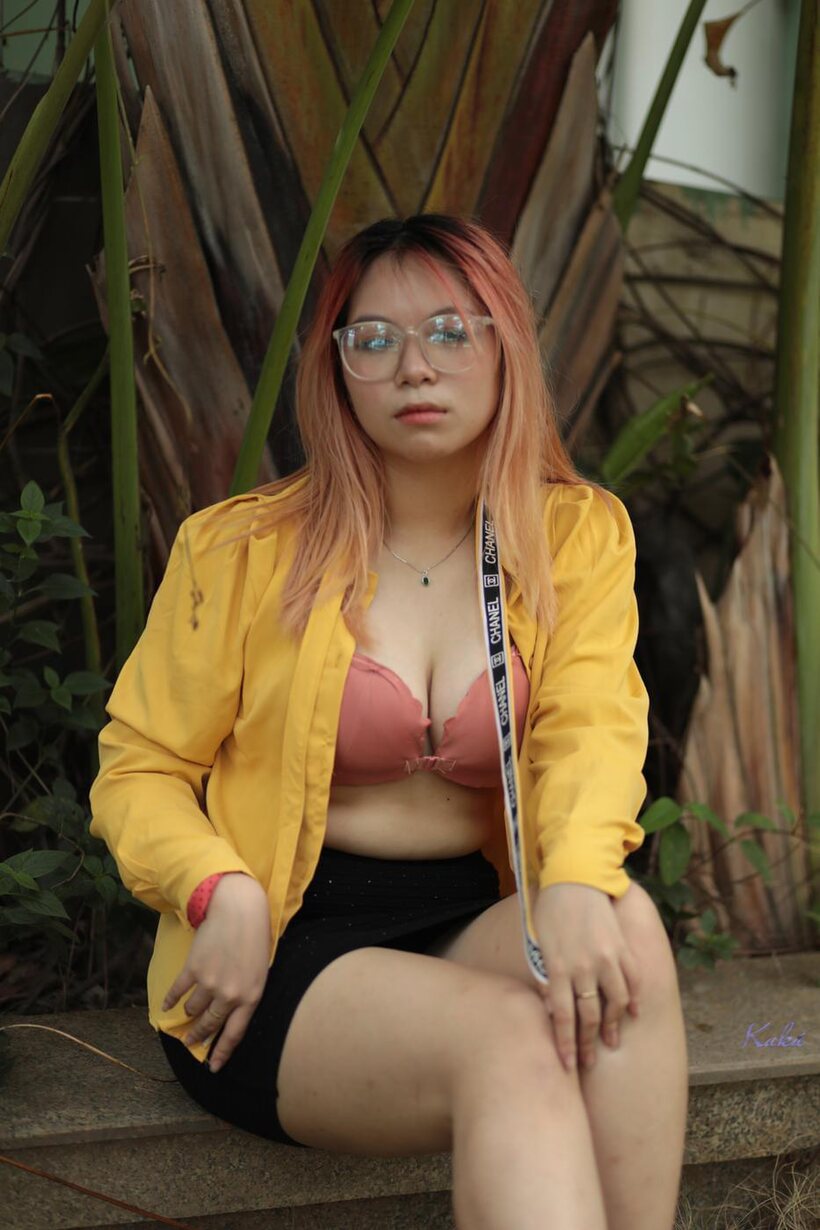 Redhead girl exposes her big tits outdoors (shot 21)