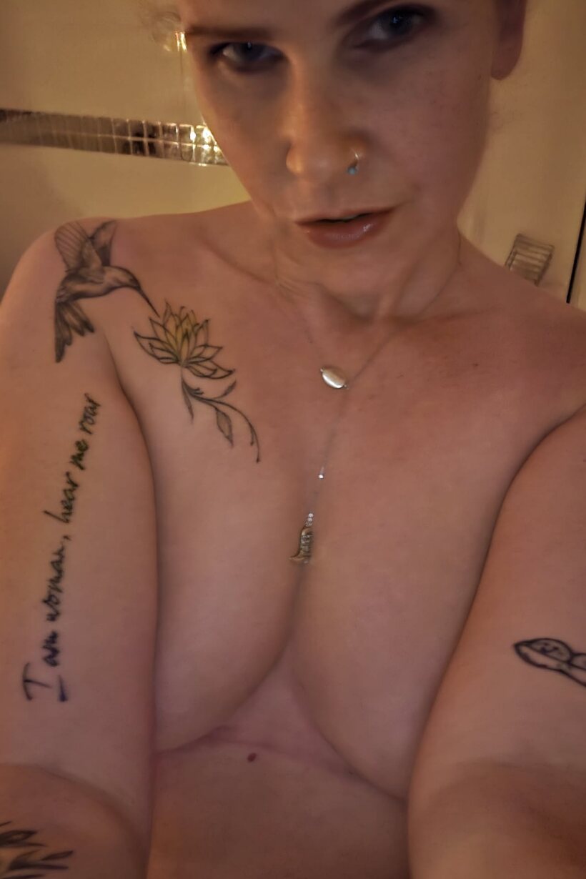 MILF gets naked in the bath (shot 2)