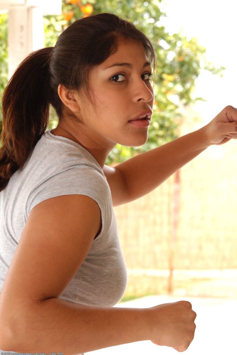Laurie Vargas pulls off her spandex pants after workout, photo 1 of 21