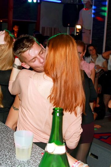 Clothed babes swap lesbian kisses and blowjob action at the party