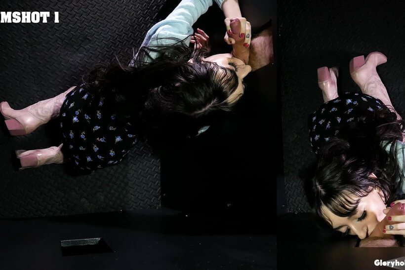 Ronnie Violet kneels for a POV blowjob at the gloryhole (shot 1)