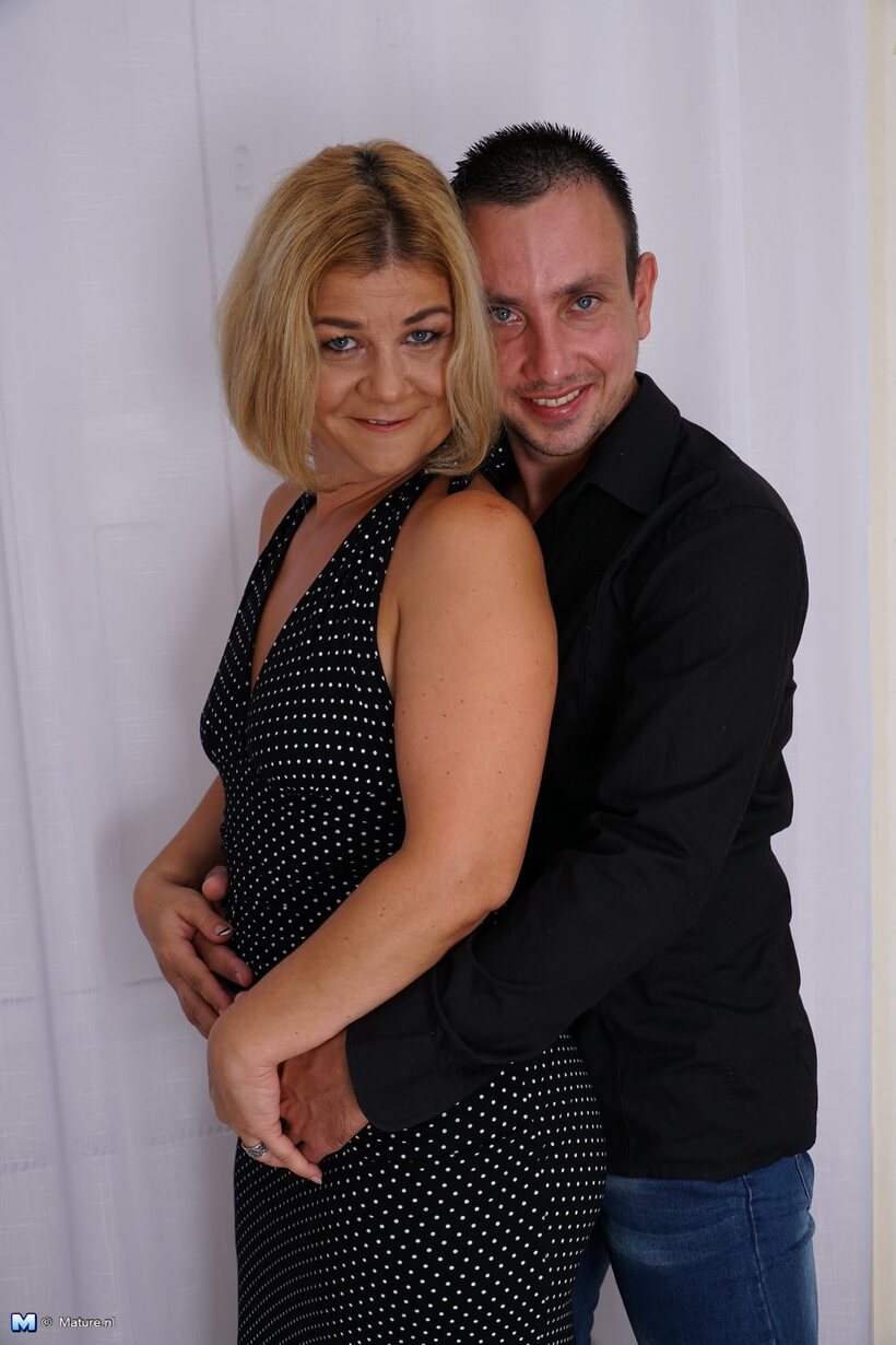 After cards, overweight blonde fucks her younger lover in bed, photo 3 of 16