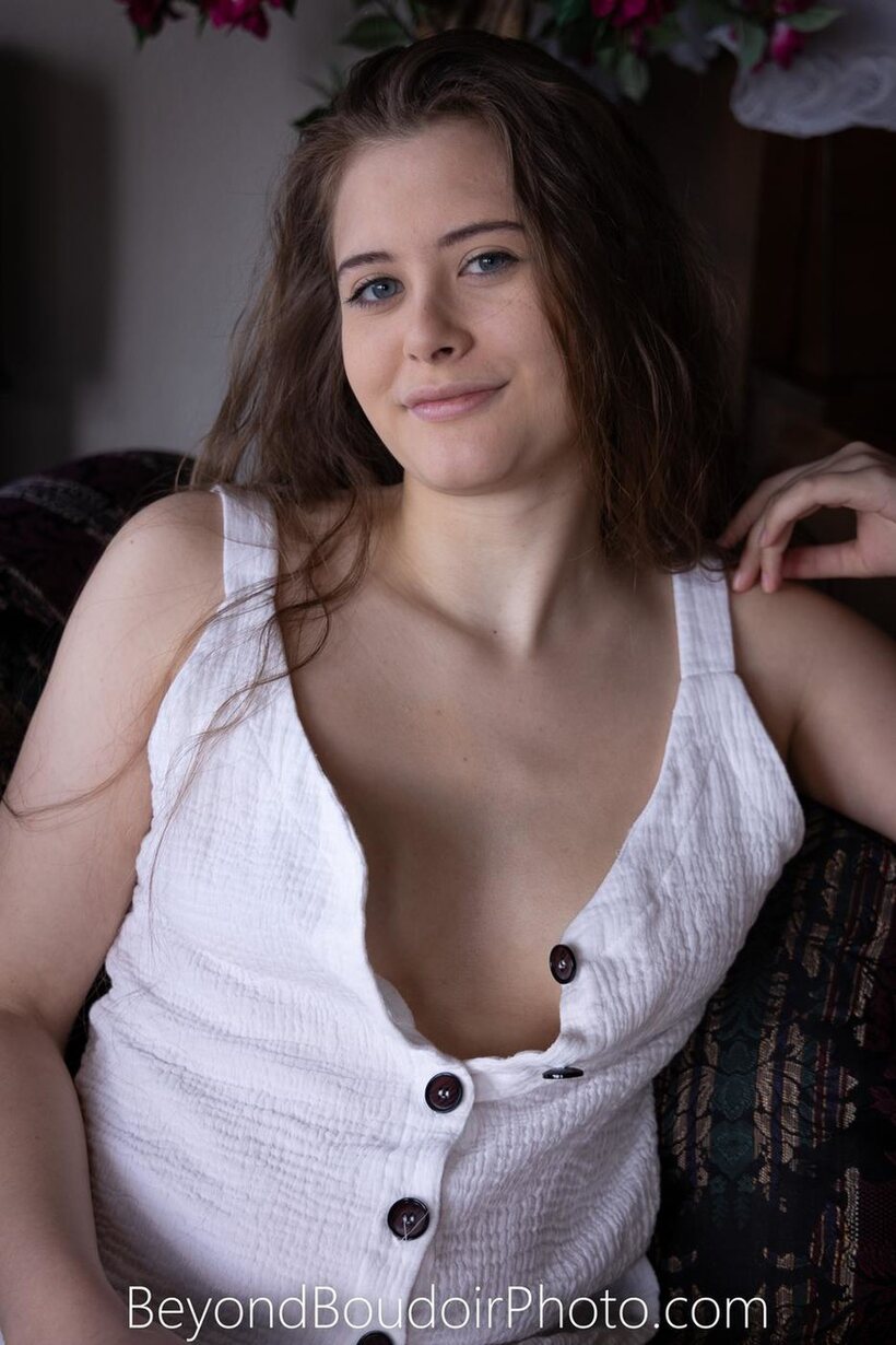 Image 12/21: Clothed girl flaunts her ass while teasing