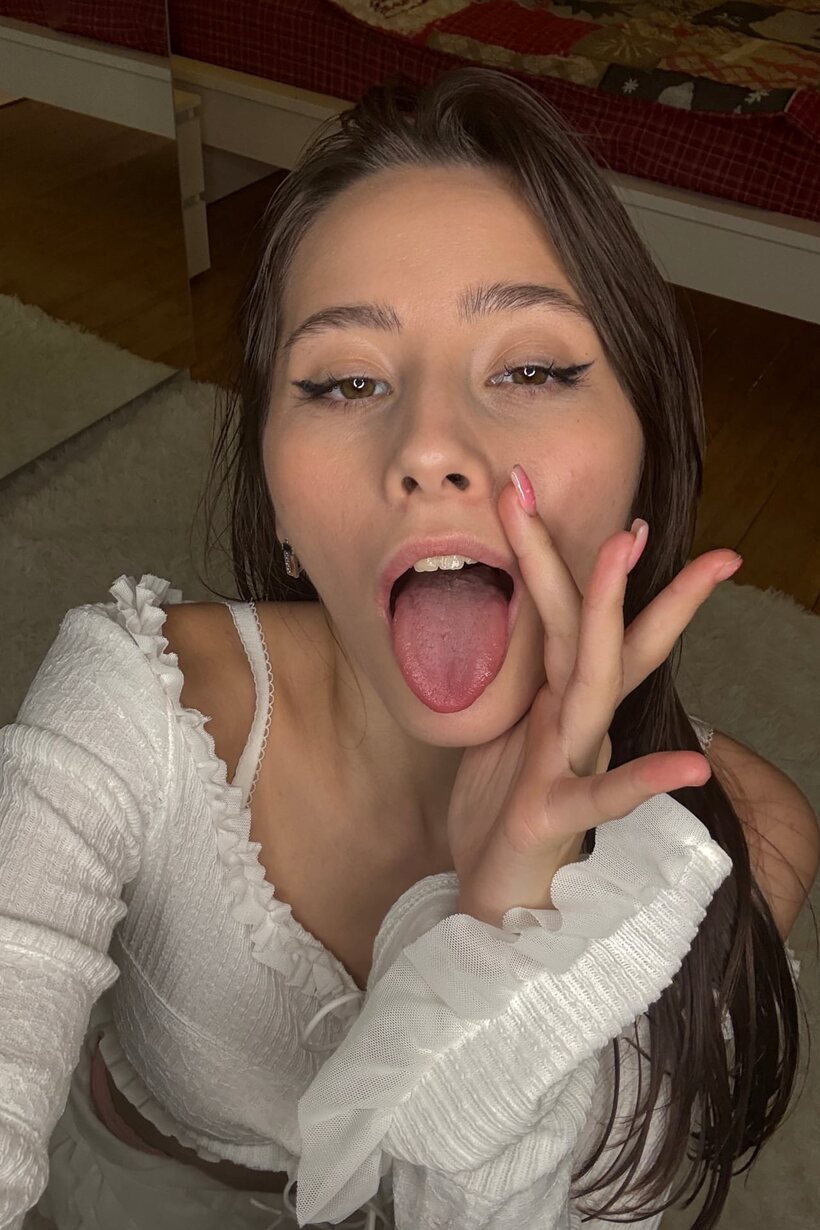 Image 15/15: Lingerie selfie shots catch this slim babe sticking out her tongue
