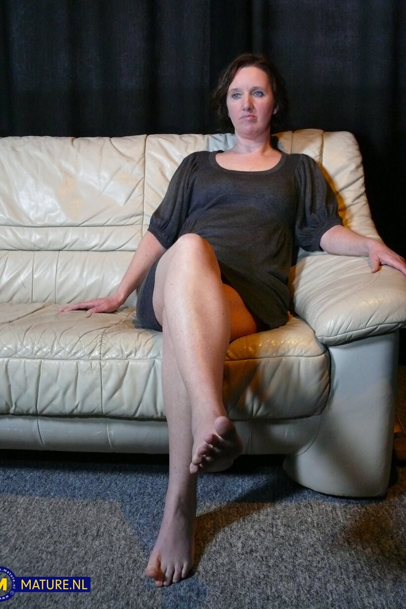 Image 1/20: Claudia R toys her pussy with a vibrator, then fingers herself at home