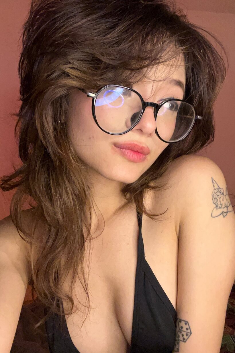 Photo 10 — Petite girl takes selfies and shows her big tits and armpit in lingerie