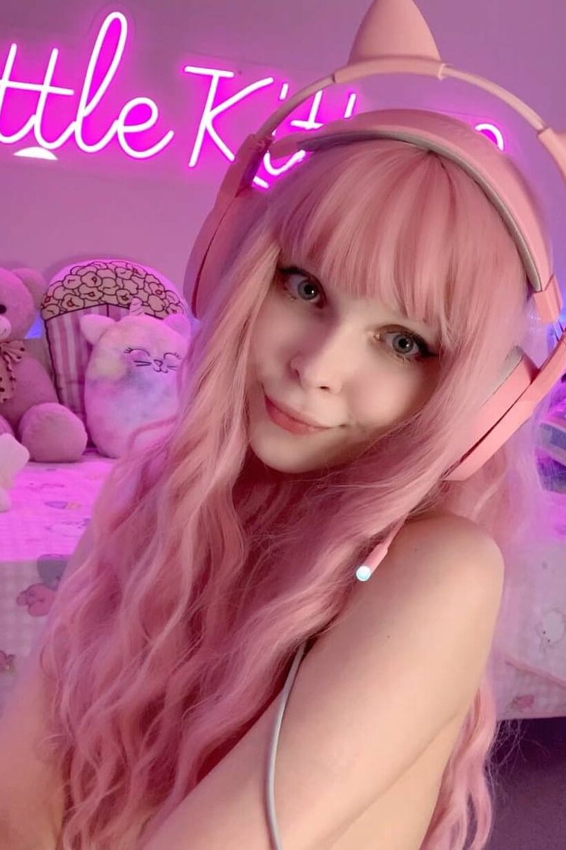 Photo 7 — Headphones on, pink-haired teen shows off her natural tits