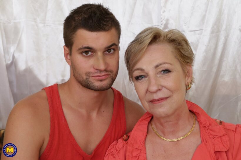 Photo 7 — Her man friend licks a mature blonde woman’s horny pussy