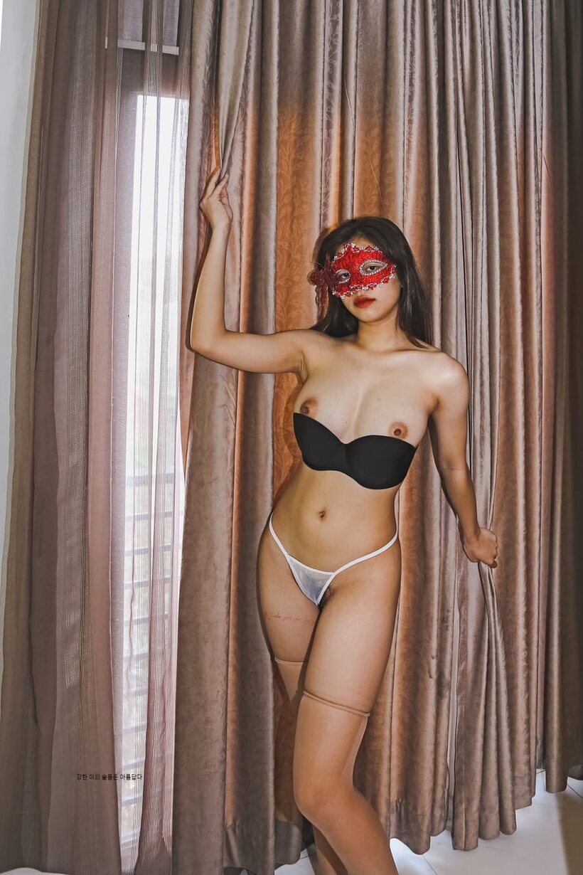 Asian pic 5 from the set «Asian girl teases and shows her tiny tits and hairy ass in stockings»