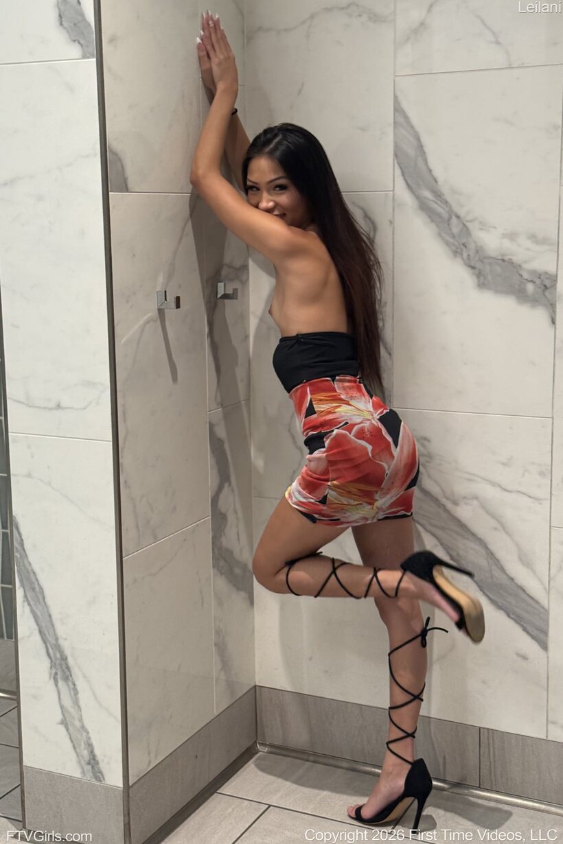 Photo 13 — In public and inside a car, this pretty Asian model bares her tits and pussy