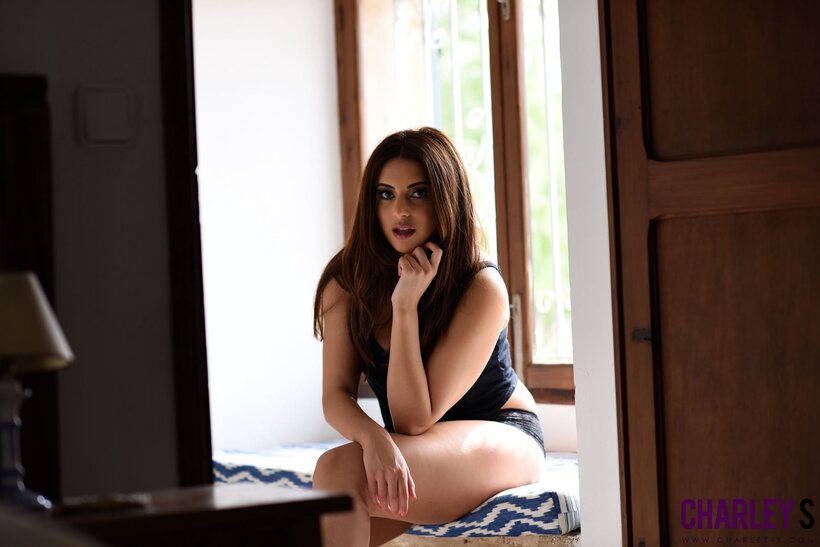 Charley S nude photo 3 — Charley S slips out of her clothes into black panties alone
