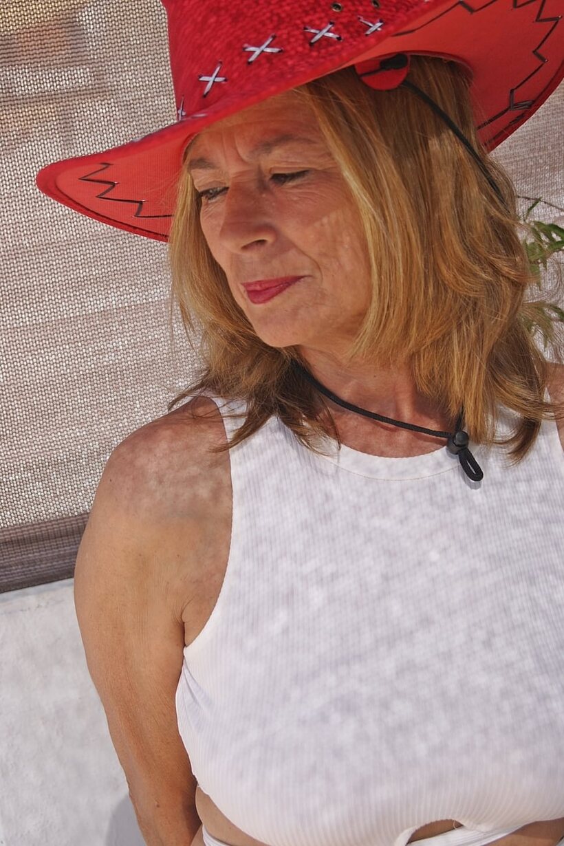 Clothed Marta Style shows off her saggy tits in a skirt, photo 5 of 16