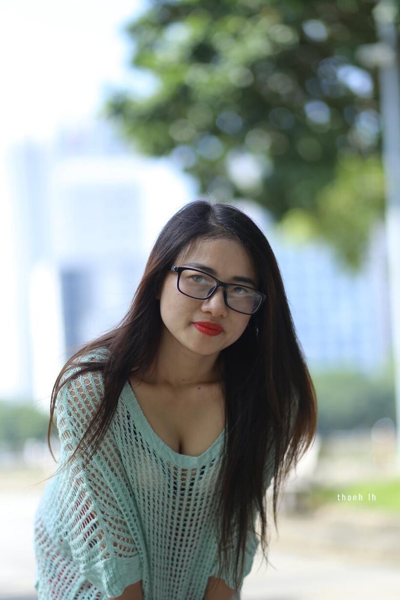 Photo 10 — Brunette girl strips out of her tight dress and poses naked