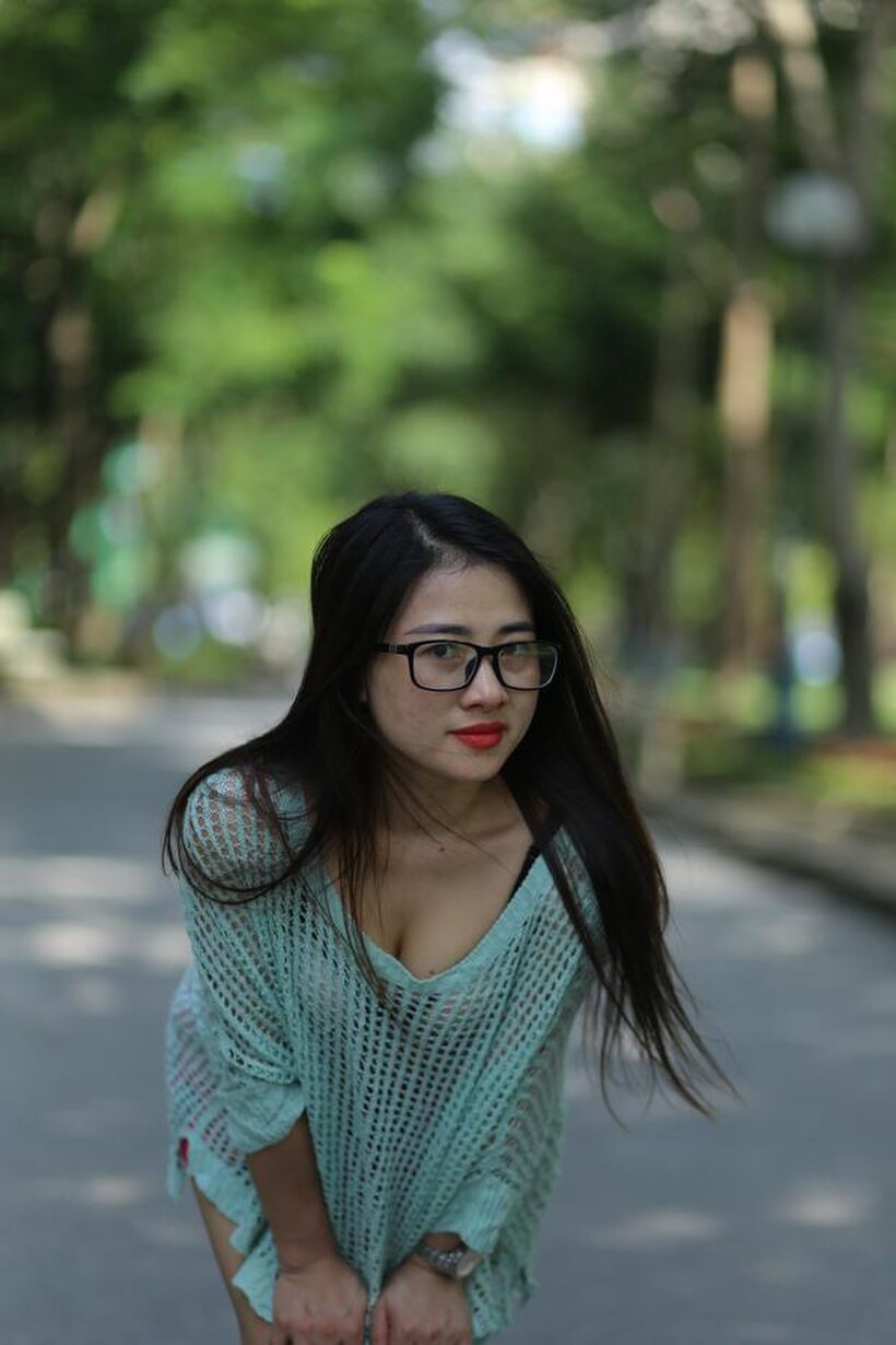 Brunette girl strips out of her tight dress and poses naked, photo 15 of 21