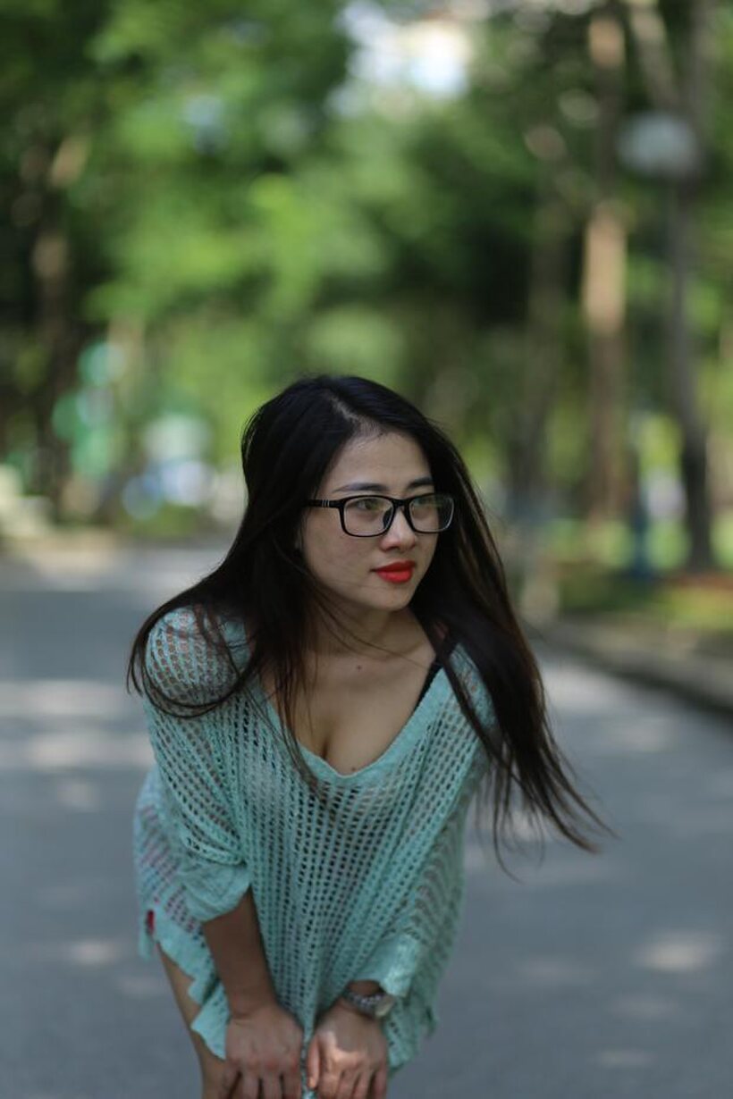 Image 16/21: Brunette girl strips out of her tight dress and poses naked
