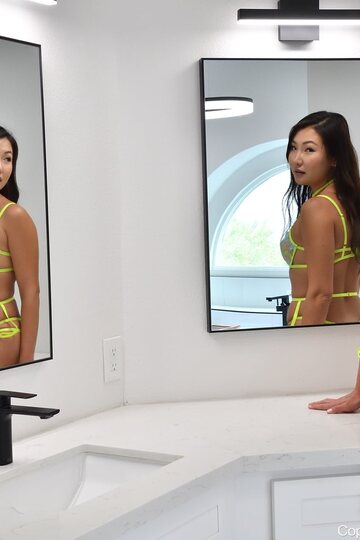 Jade Luv rides a dildo and sucks it in the bathroom