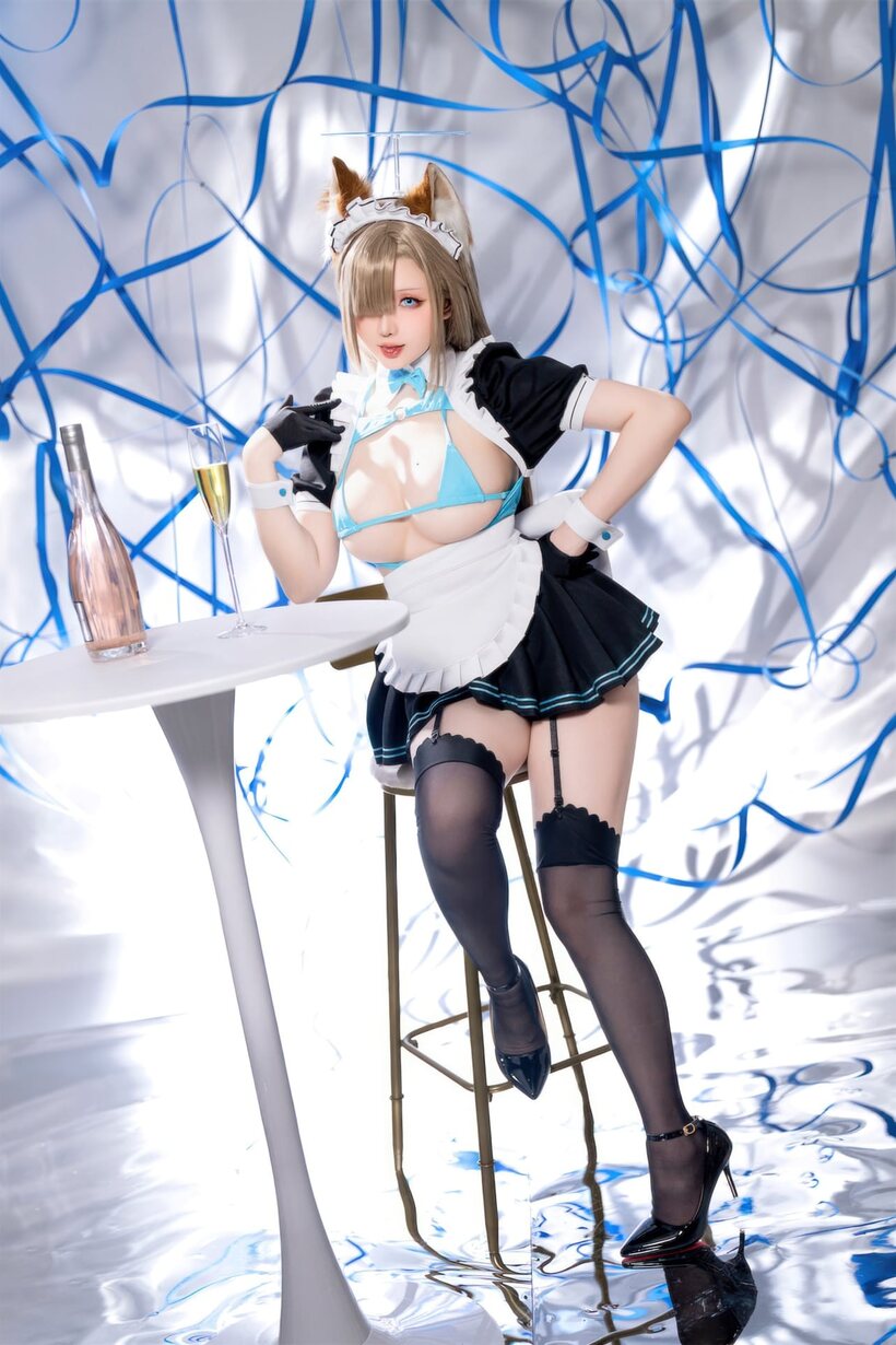 Image 2/10: Stockings and a maid outfit show off her big ass and tits