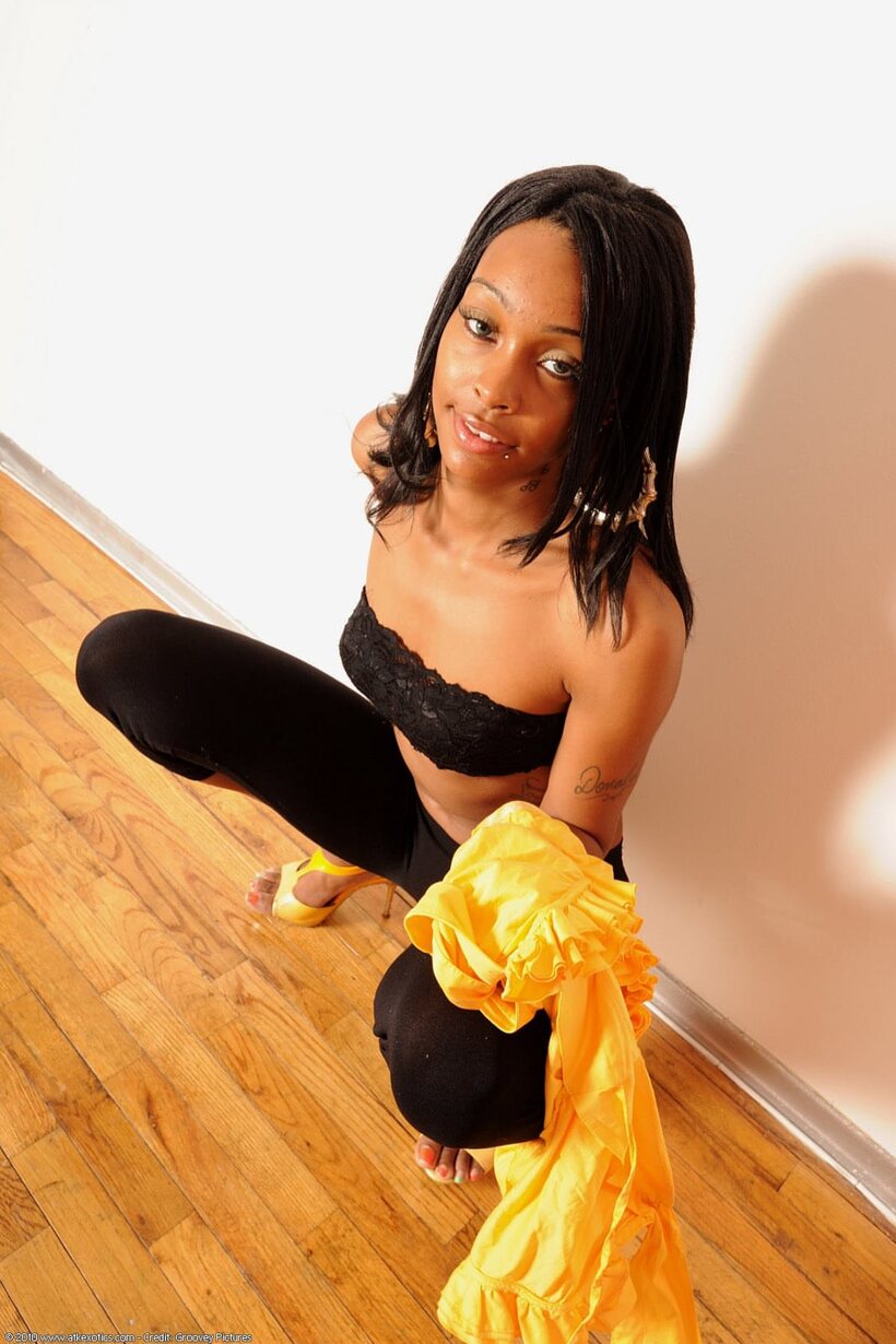 Black girl slips out of spandex and bra, then poses nude in heels, photo 5 of 21