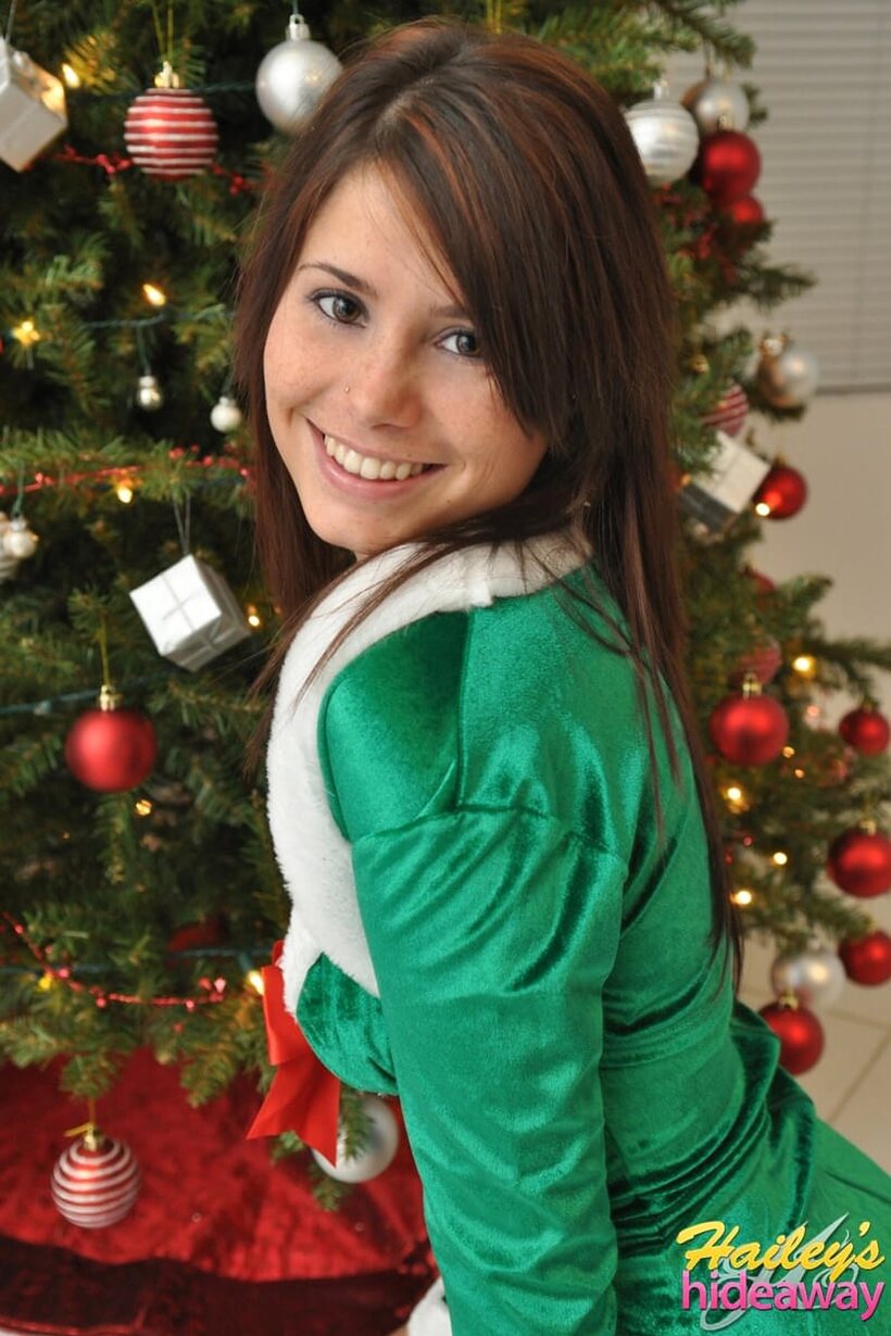Image 6/12: Clothed Hailey Leigh shows off her big tits and small ass for Christmas