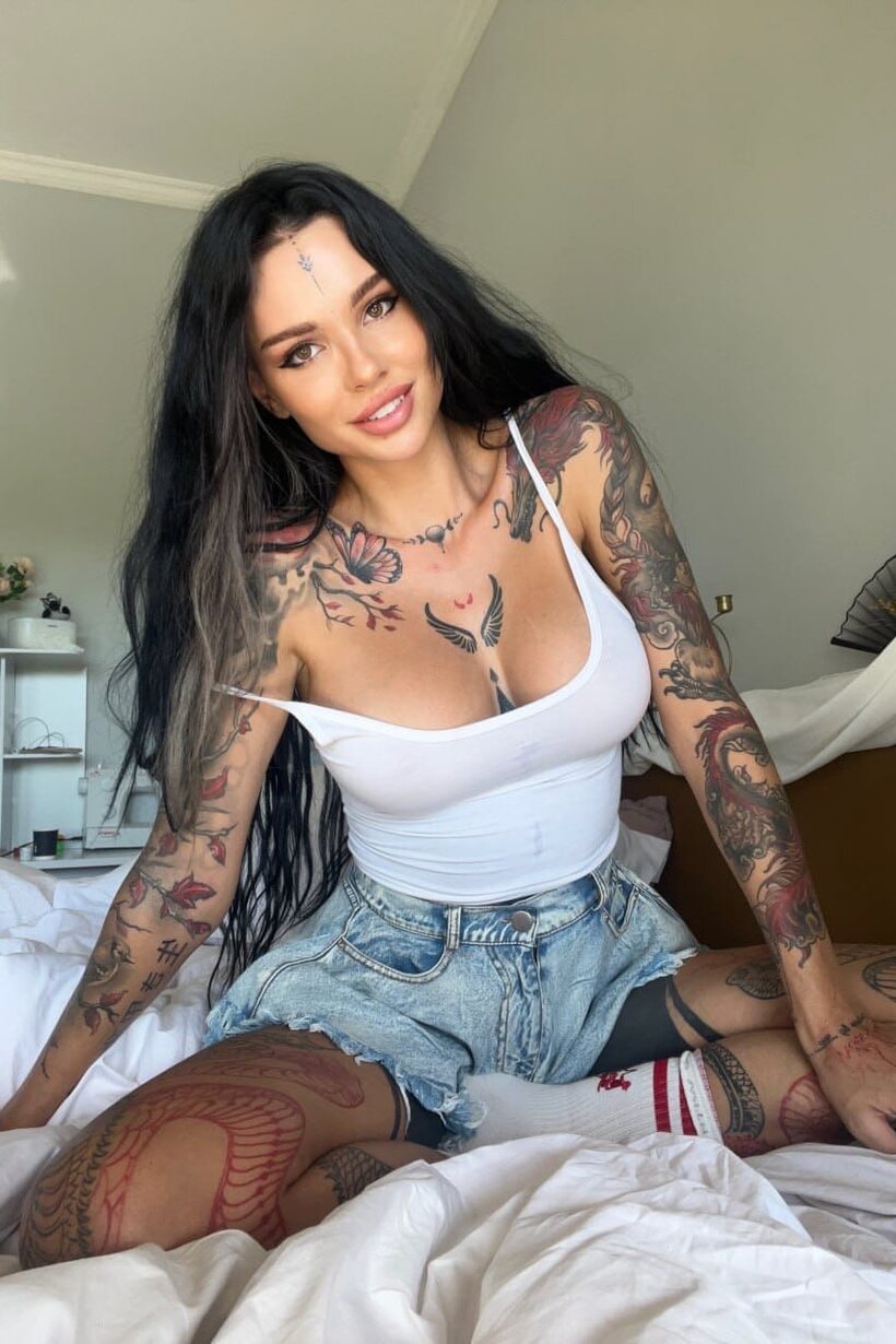 Brunette girl flaunts her big tits while teasing (shot 9)