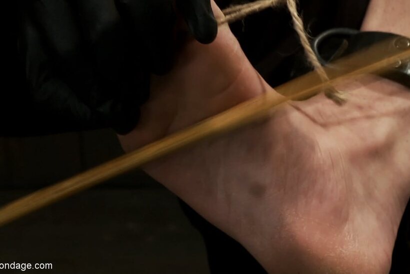 Image 4/21: Tied up and teased, Isis Love joins a man and woman