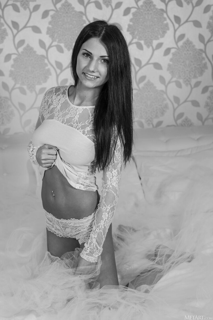 Glamour model strips out of her panties and shows her big tits and open pussy (shot 17)
