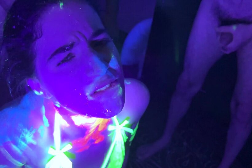 Vanessa Cliff takes part in a glow-lit gangbang party (shot 7)