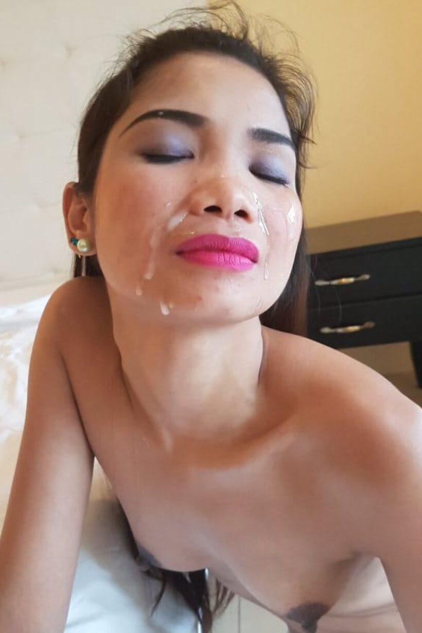 Photo 15 — He cums on the face of a skinny Filipina in stockings