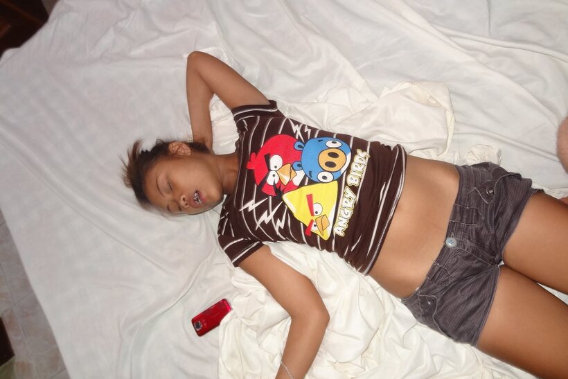 Hot bedroom tease shows a long-haired Asian amateur’s puffy pussy, photo 3 of 20