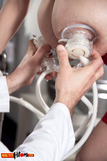 Lab techs milk an Asian big-tit girl until she squirts hard