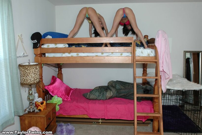 Taylor Twins nude photo 4 — Taylor Twins hide their bare tits in thongs on a bunk bed