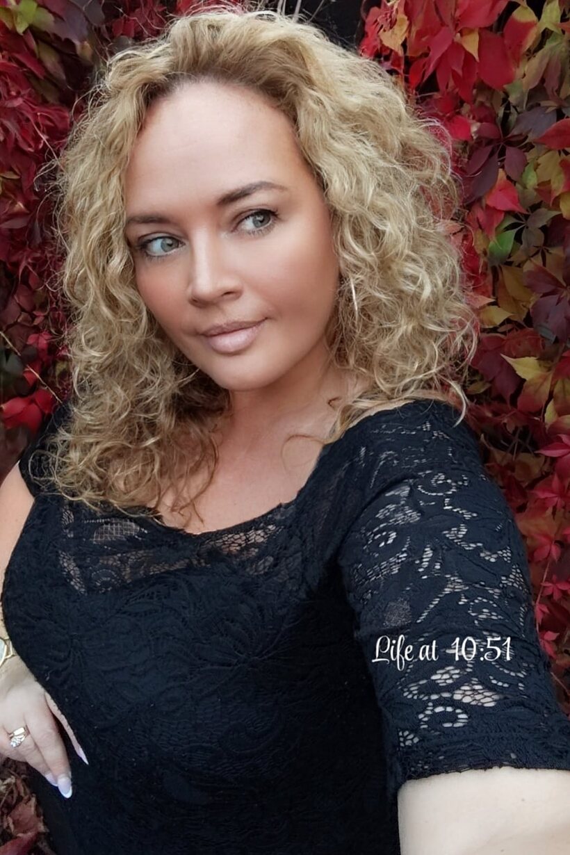 Curly-haired BBW shows off her big tits in lingerie shots, photo 2 of 10