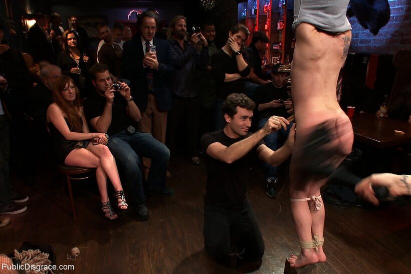 Photo 11 — Jessi Palmer gets hogtied and mounted on a cross at the bar