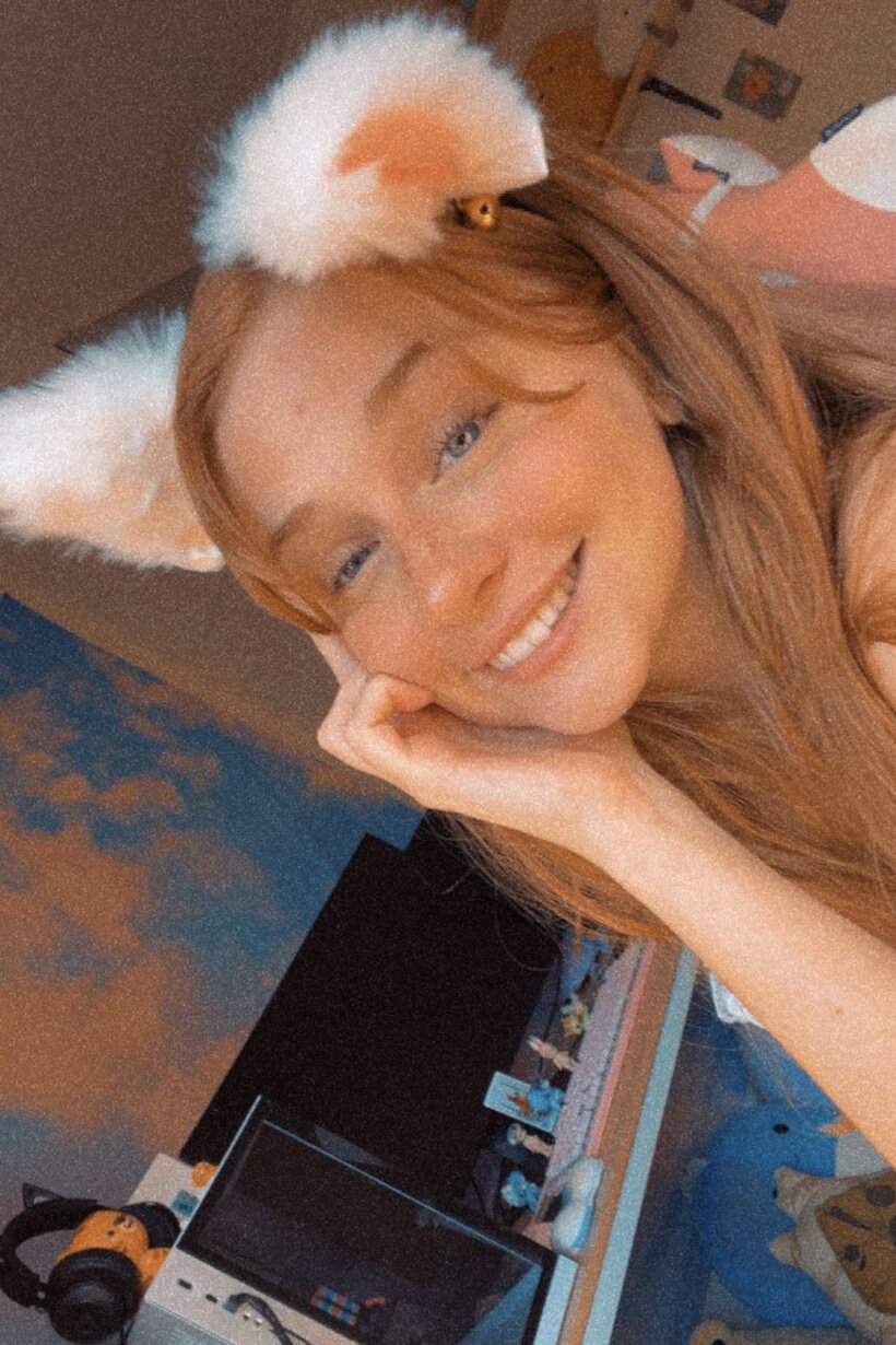 Amateur nude photo 5 — Redhead snaps selfies while slipping into a crotchless dress