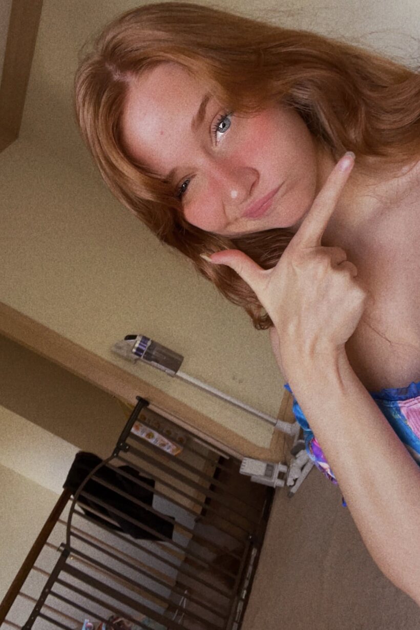 Image 8/14: Redhead snaps selfies while slipping into a crotchless dress