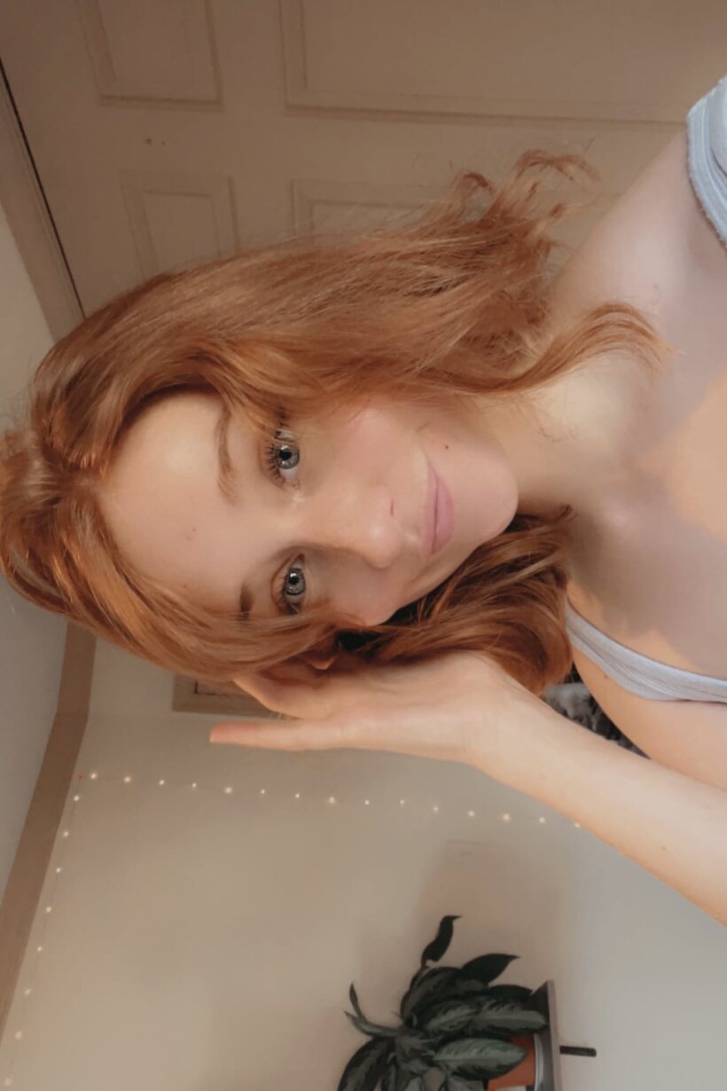 Amateur nude photo 12 — Redhead snaps selfies while slipping into a crotchless dress